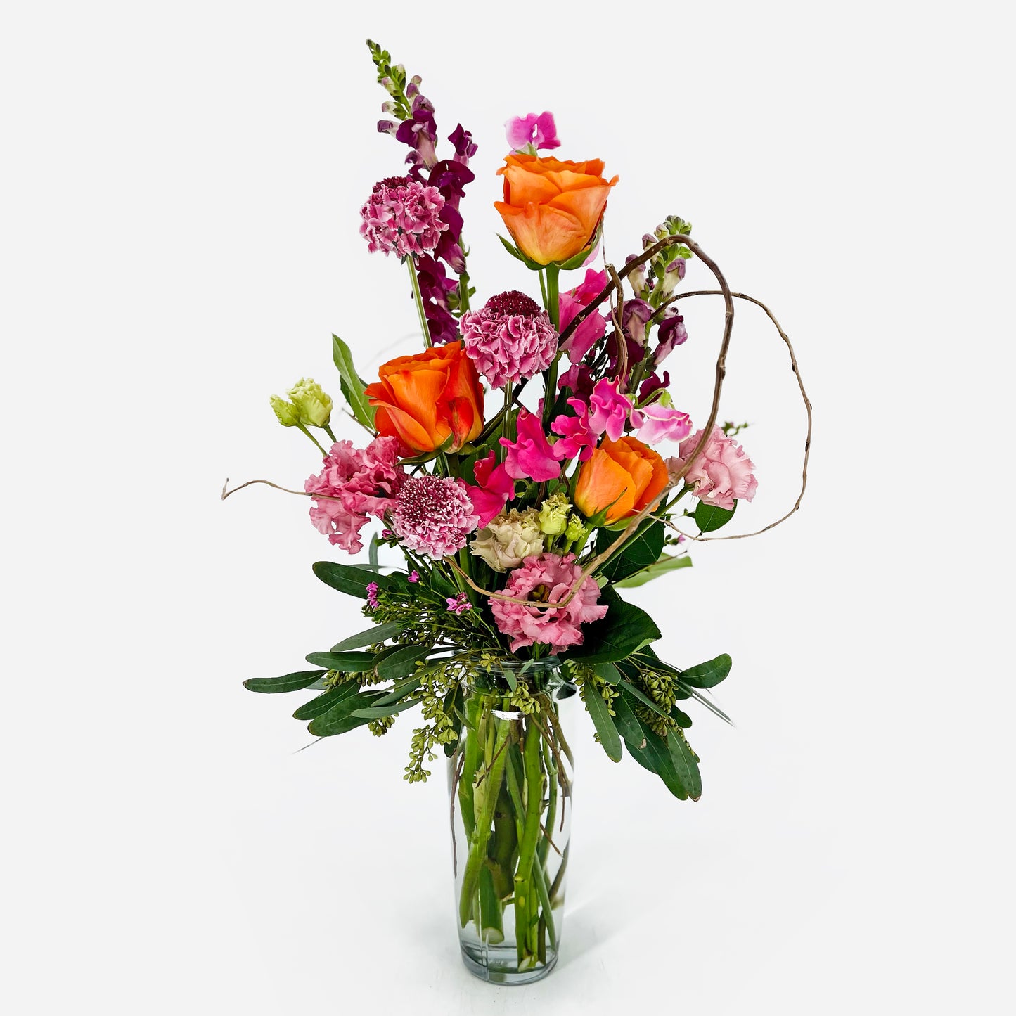 Small flower arrangement with scabiosa, roses, ranunculus and lisianthus from Artichokes & Pomegranates Floral Design. Order online for delivery or pickup in Santa Fe.